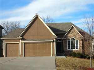 All one level with flat driveway and three car garage.